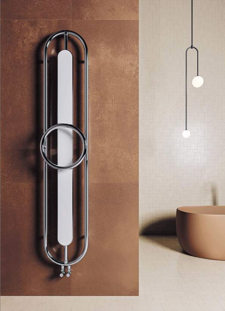 Carisa Aiden Heated Towel Radiator, fixed to a brown wall in a bathroom space