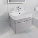 Tissino Loretto Basin Unit Furniture, 570mm grey fixed to a wall in a bathroom