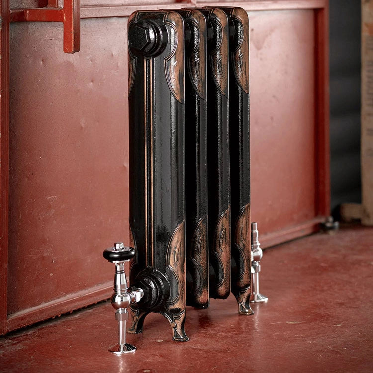 Arroll Art Deco Cast Iron Radiator, next to a red painted wall and floor