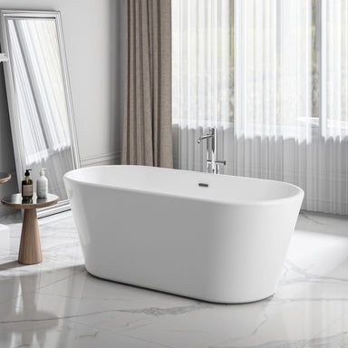 charlotte edwards grosvenor bath tub in the middle of a white luxury bathroom with freestanding bath in the middle