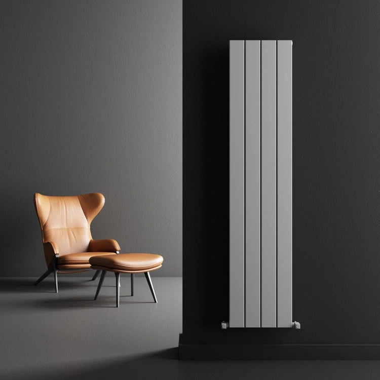 Carisa Angers Vertical Aluminium Radiator, fixed to a black painted wall in a living space