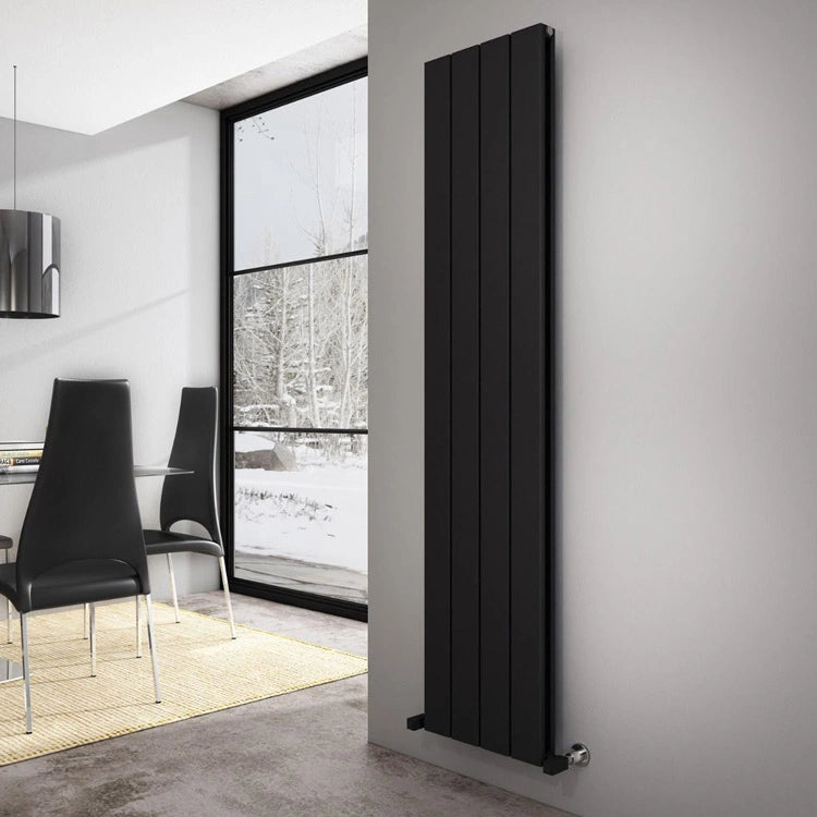 Carisa Angers Double Vertical Aluminium Radiator, fixed to a white wall in a living space