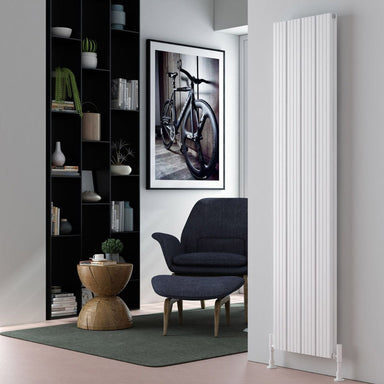 Carisa Chambord Double Vertical Aluminium Radiator, fixed to a white wall in a living space