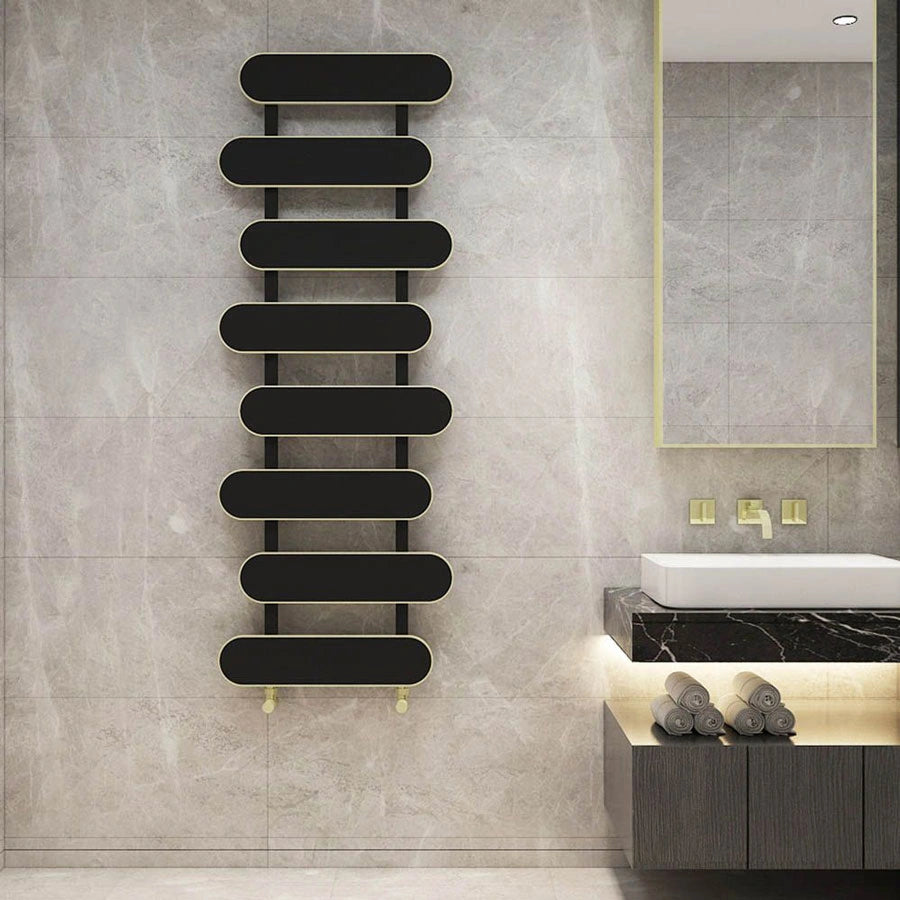 Carisa Magico Bath Aluminium Towel Radiator, fixed to a tile wall in a bathroom space