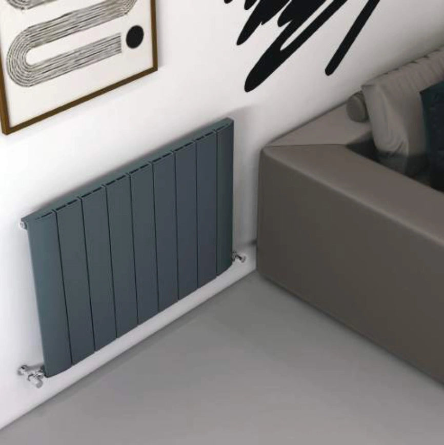 Carisa Slim Horizontal Aluminium Radiator, fixed to a white wall in a living room 