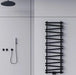 Carisa Vivek Aluminium Towel Radiator, fixed to a white wall in a shower room
