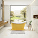 Charlotte Edwards Ersa Small Freestanding Bath, bespoke painted yellow, in a bathroom space