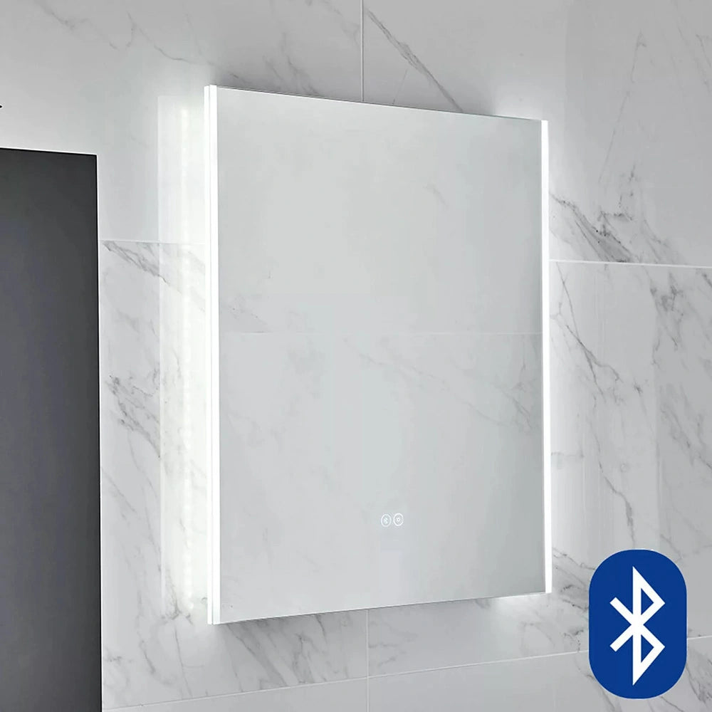 Tissino Angelo Bluetooth Mirror Touch Sensor & Light, fixed to a wall in a bathroom space