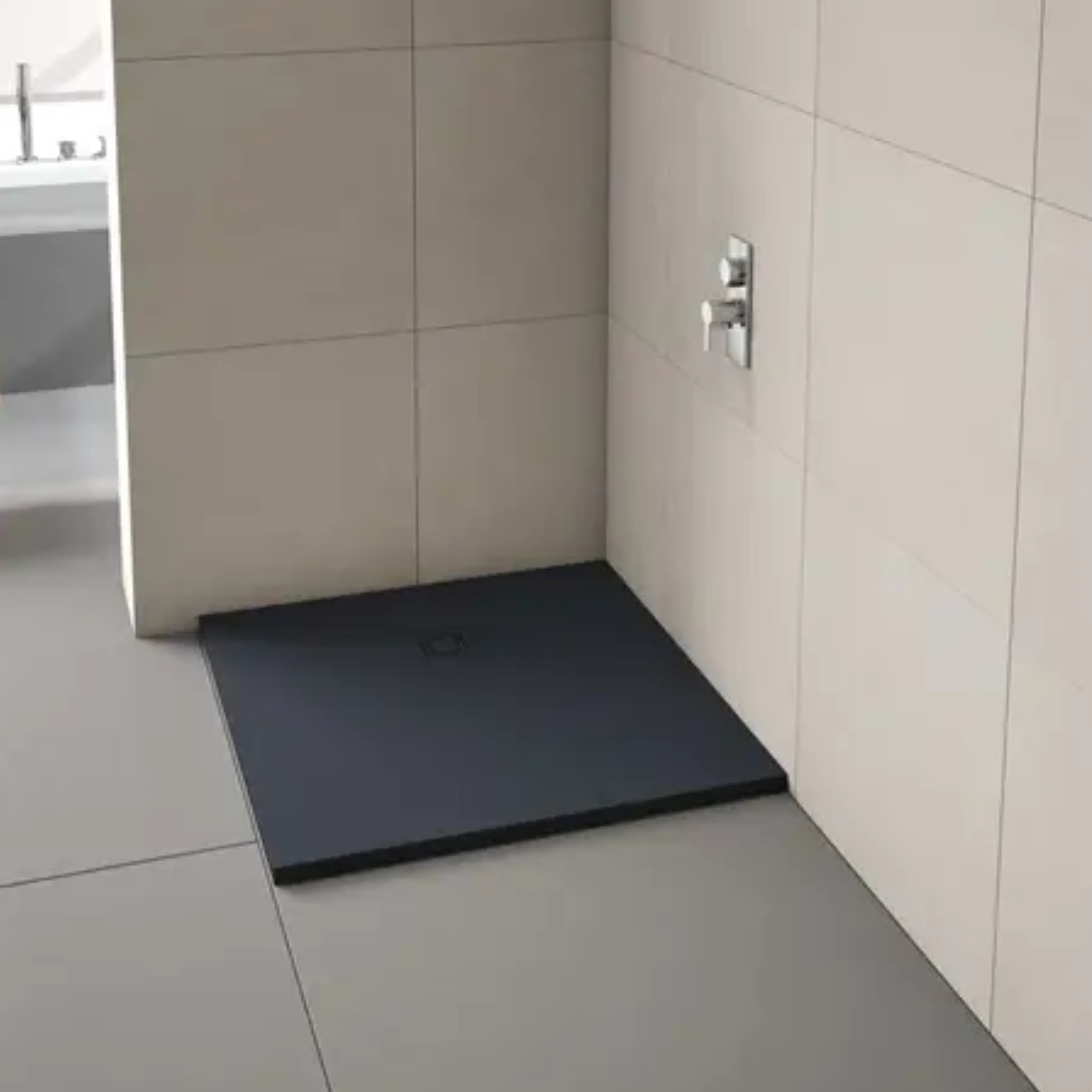 Truestone square shower tray in black, in a bathroom setting