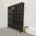 Arroll Neo Classic 3 Column Cast Iron Radiator black radiator fixed next to a white wall