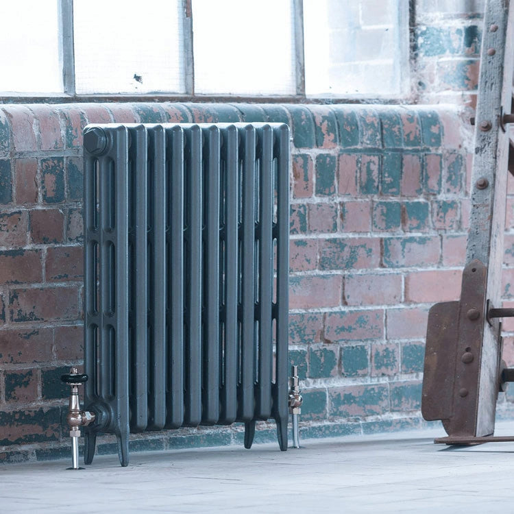 Arroll Neo Classic 3 Column Cast Iron Radiator in a industrial living space