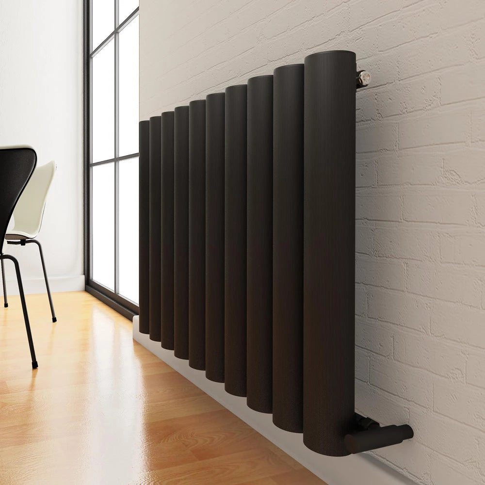 Carisa Otto Horizontal Aluminium Radiator, fixed to a wall in a living space