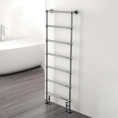 Carisa Victoria Towel Radiator fixed to a white wall in a bathroom space
