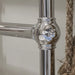 close up macro image of the chrome finish on the Carron Colossus Towel Radiator Floor Mounted 