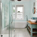 Charlotte Edwards Belgravia Gloss White Freestanding Bath 1690x730mm in a blue bathroom interior 