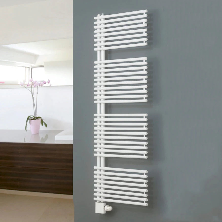 Eucotherm Ceres Plus Towel Radiator wall hanging in a living space, white with contrasting grey wall