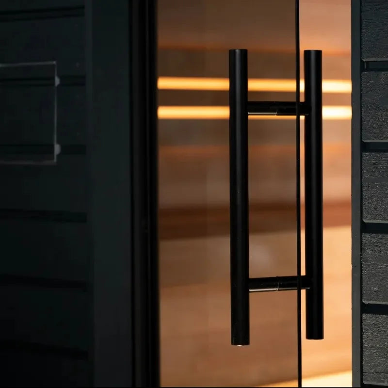 black door handle on a saunum sauna