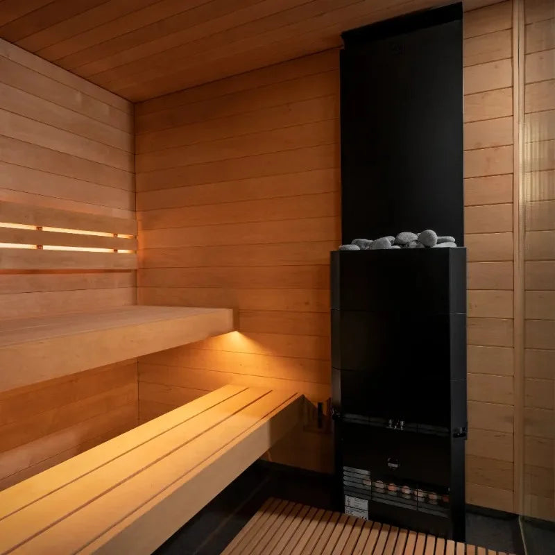 inside view showing the benches and the sauna heater within the saunum classic sauna