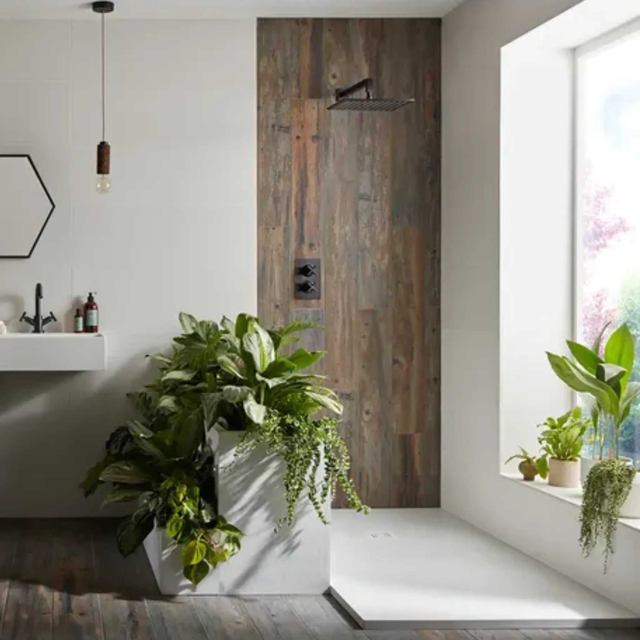 merlyn truestone rectangular shower tray white in a bathroom space