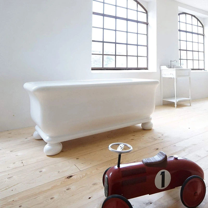 BC Designs Senator Cian Freestanding Bath, 1800mm x 840mm BAB045 in bedroom with wooden floor