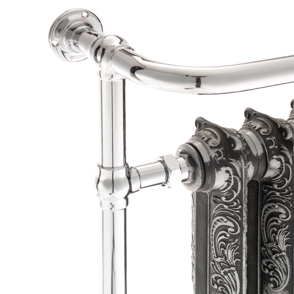close up image of heated towel radiator aged vintage detail chrome outer