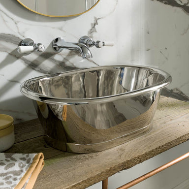 BC Designs Nickel Gleaming Roll Top Bathroom Wash Basin / Sink in size 530mm x 345mm sitting on wooden vanity unit