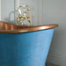 BC Designs Blue Patinata Antique Copper Bath, Roll Top Bathtub 1700mm x 725mm showing roll top design with tap in background