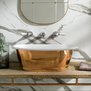 BC Designs Copper Enamel Roll Top Bathroom Wash Basin 530mm x 345mm within a bathroom sitting on a wooden vanity unit