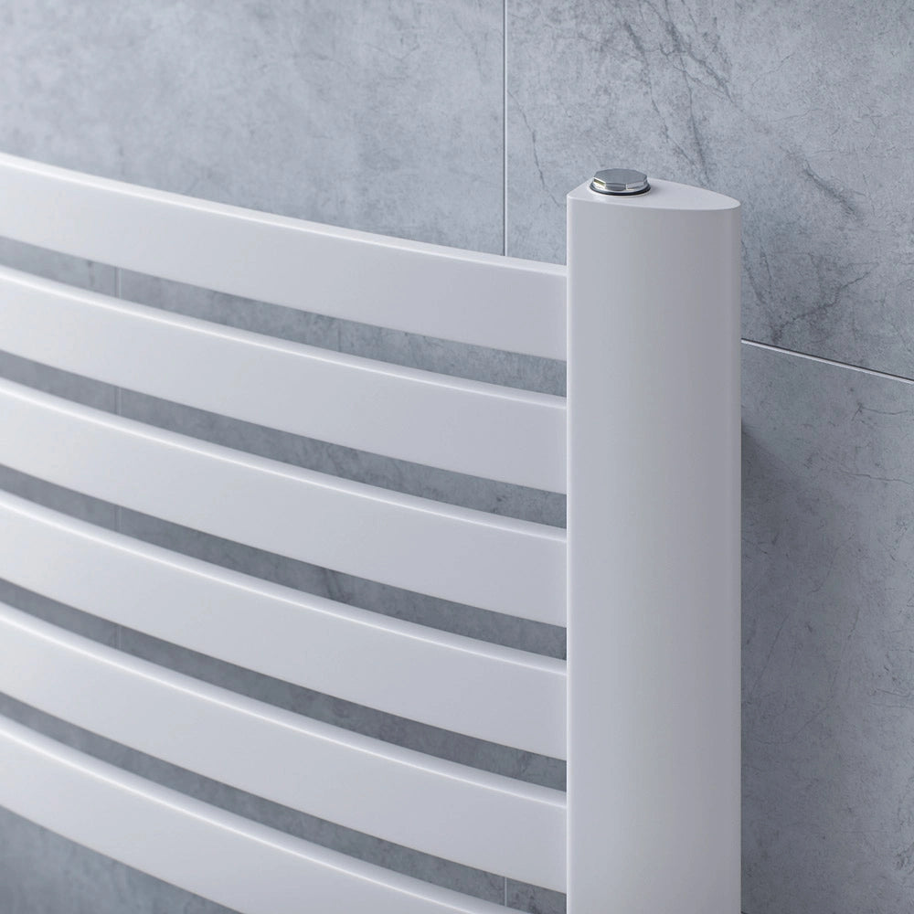 Eucotherm radiators close up detail of white curved steel frame heated towel rail